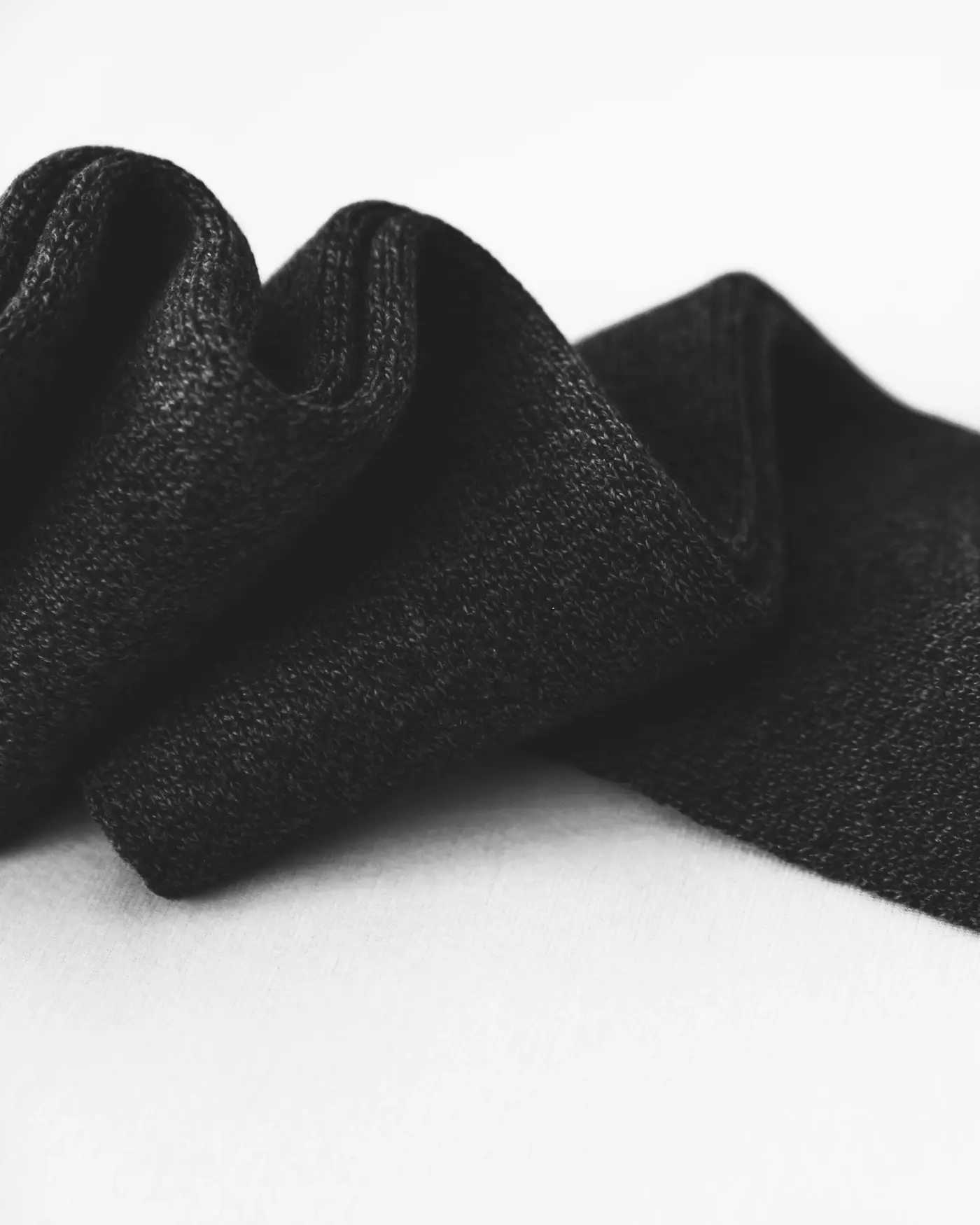 Black cloth folded on white
